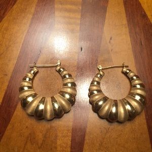 Gold Shrimp earrings.